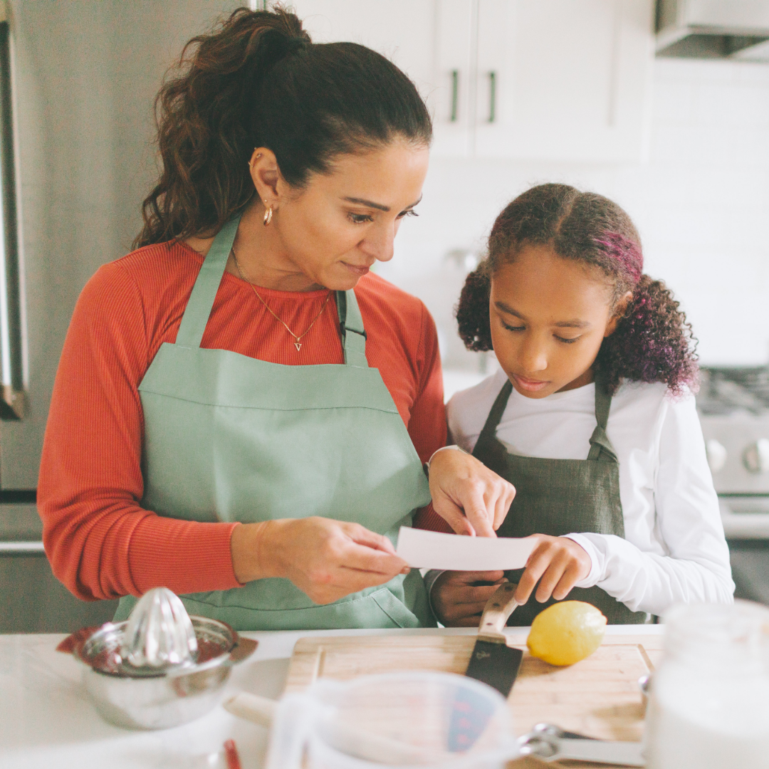 Stock - mother and daughter cooking